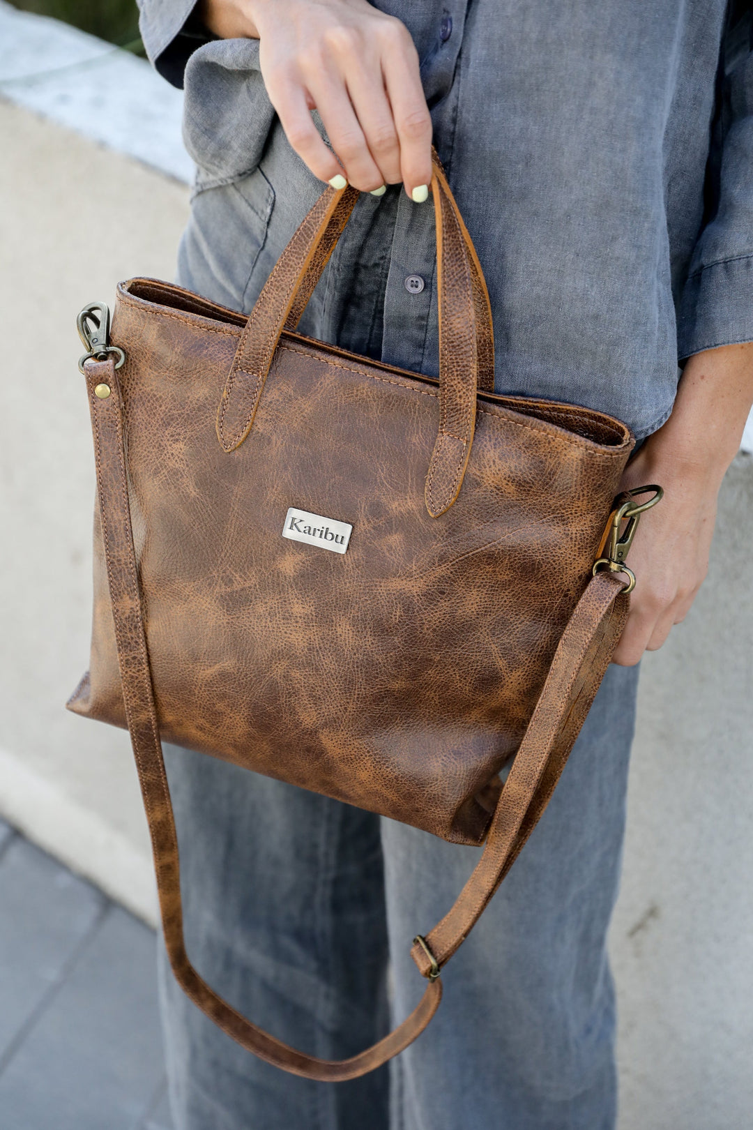 "Kika Coffee Marbled Wallet" can be rewritten as "Marbled Coffee-Colored Wallet by Kika".
