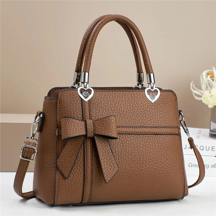 AMARA BOW HEART BAG