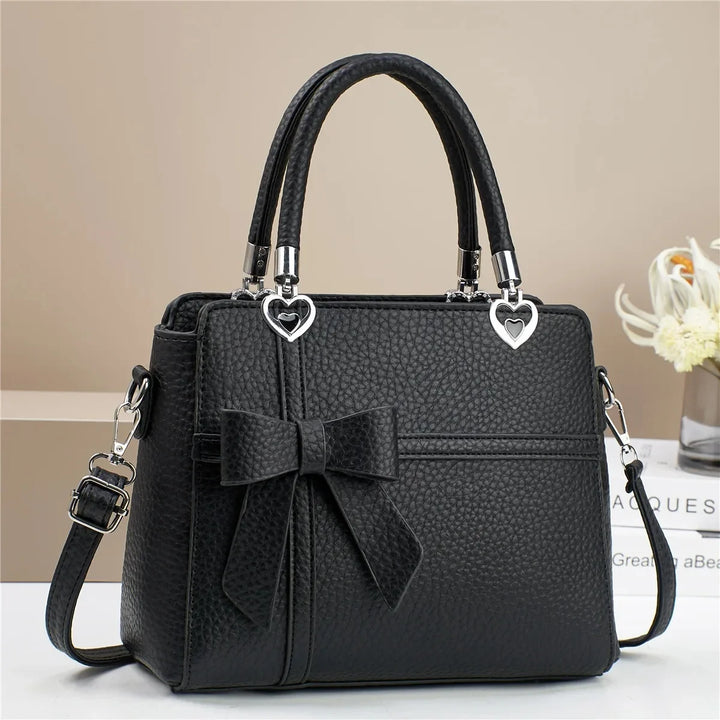 AMARA BOW HEART BAG