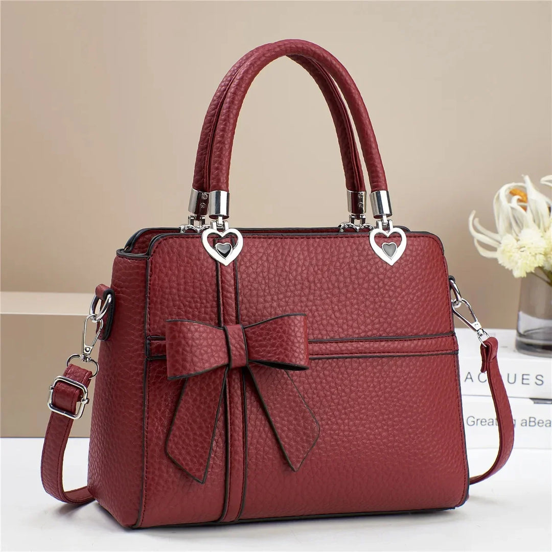 AMARA BOW HEART BAG