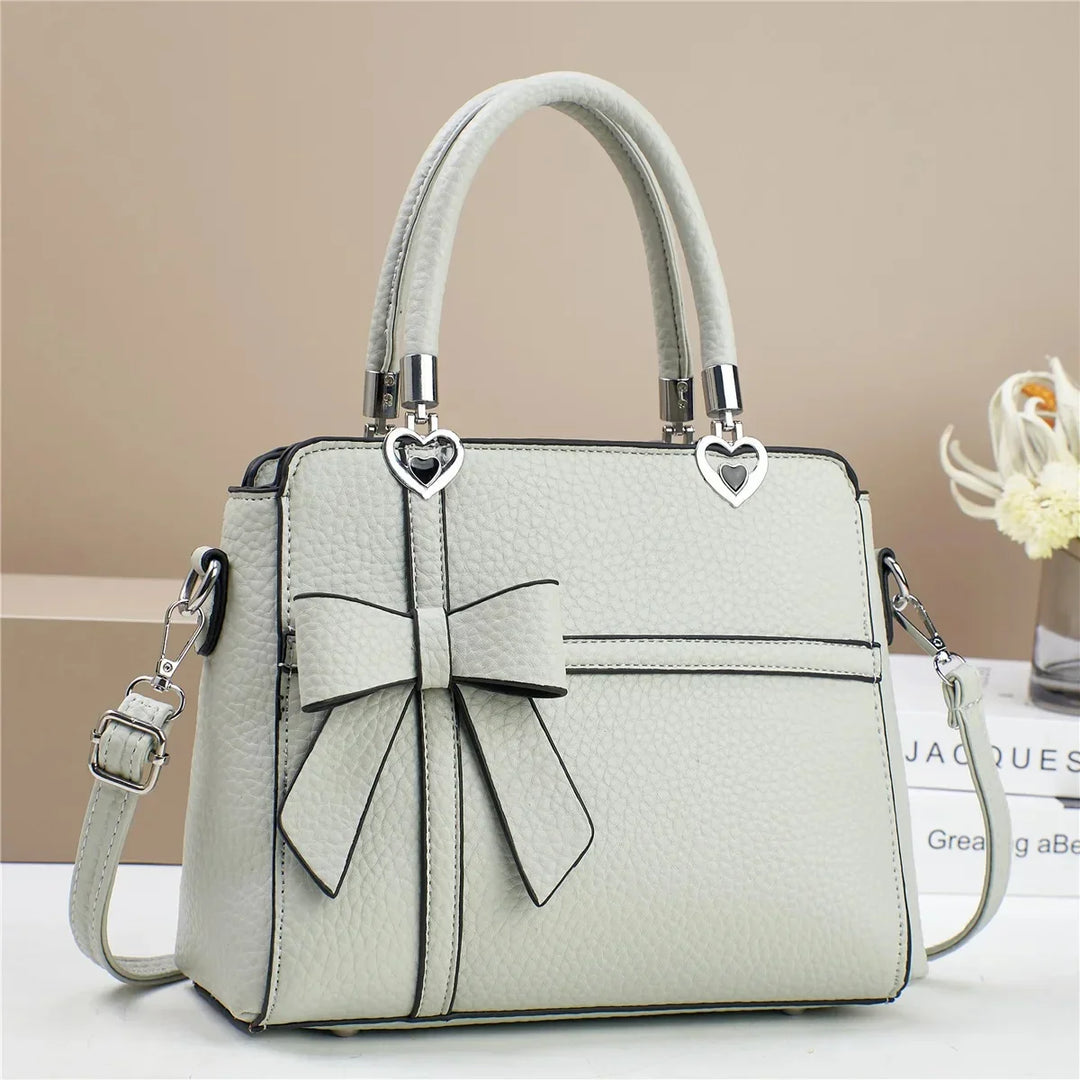 AMARA BOW HEART BAG