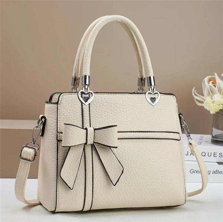 AMARA BOW HEART BAG